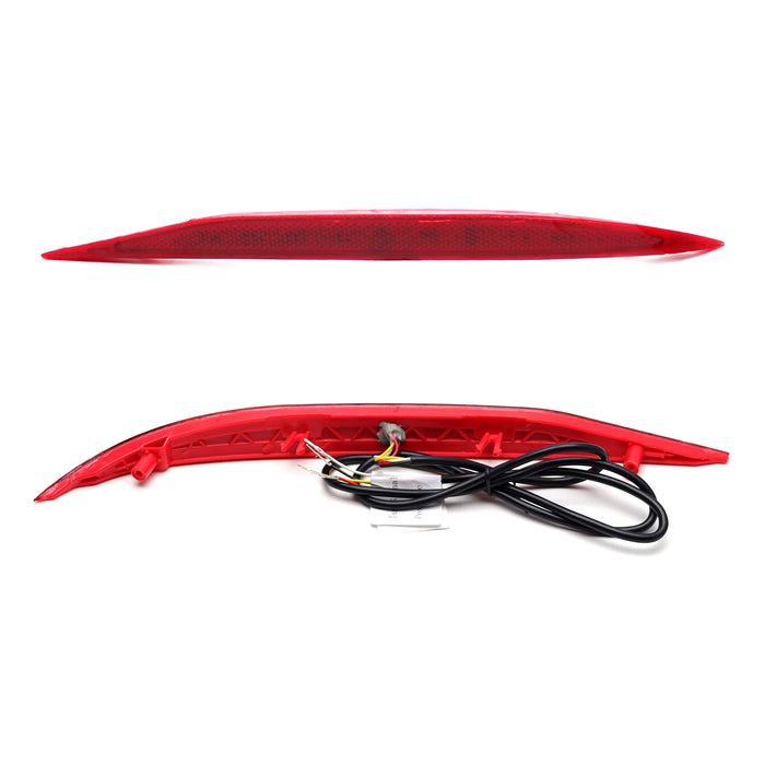 Two red car reflector with lights with wiring on a white background