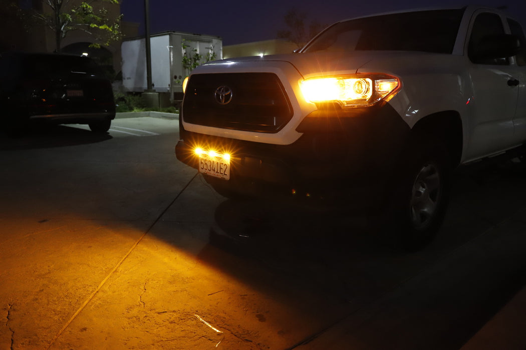Front LicensePlate Frame Mount Raptor Style Amber LED Driving/Clearance LightBar